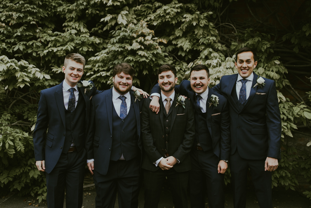farnham castle weddings groom and groomsmen prep