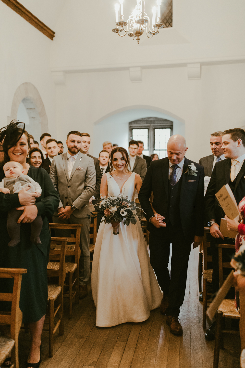 farnham castle wedding chapel ceremony bride and groom
