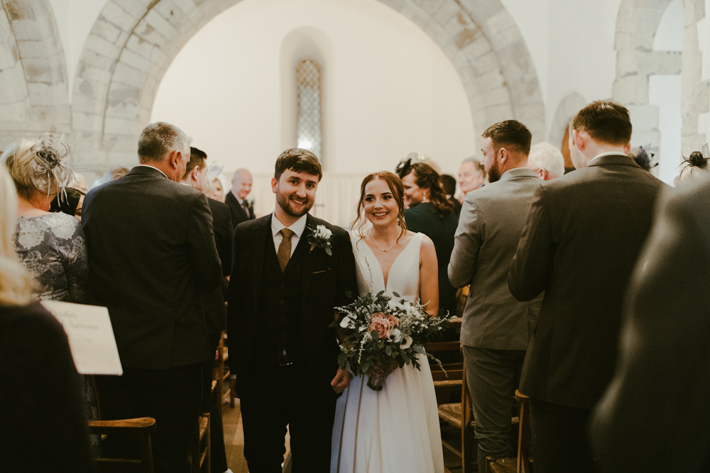 farnham castle wedding chapel ceremony bride and groom exit